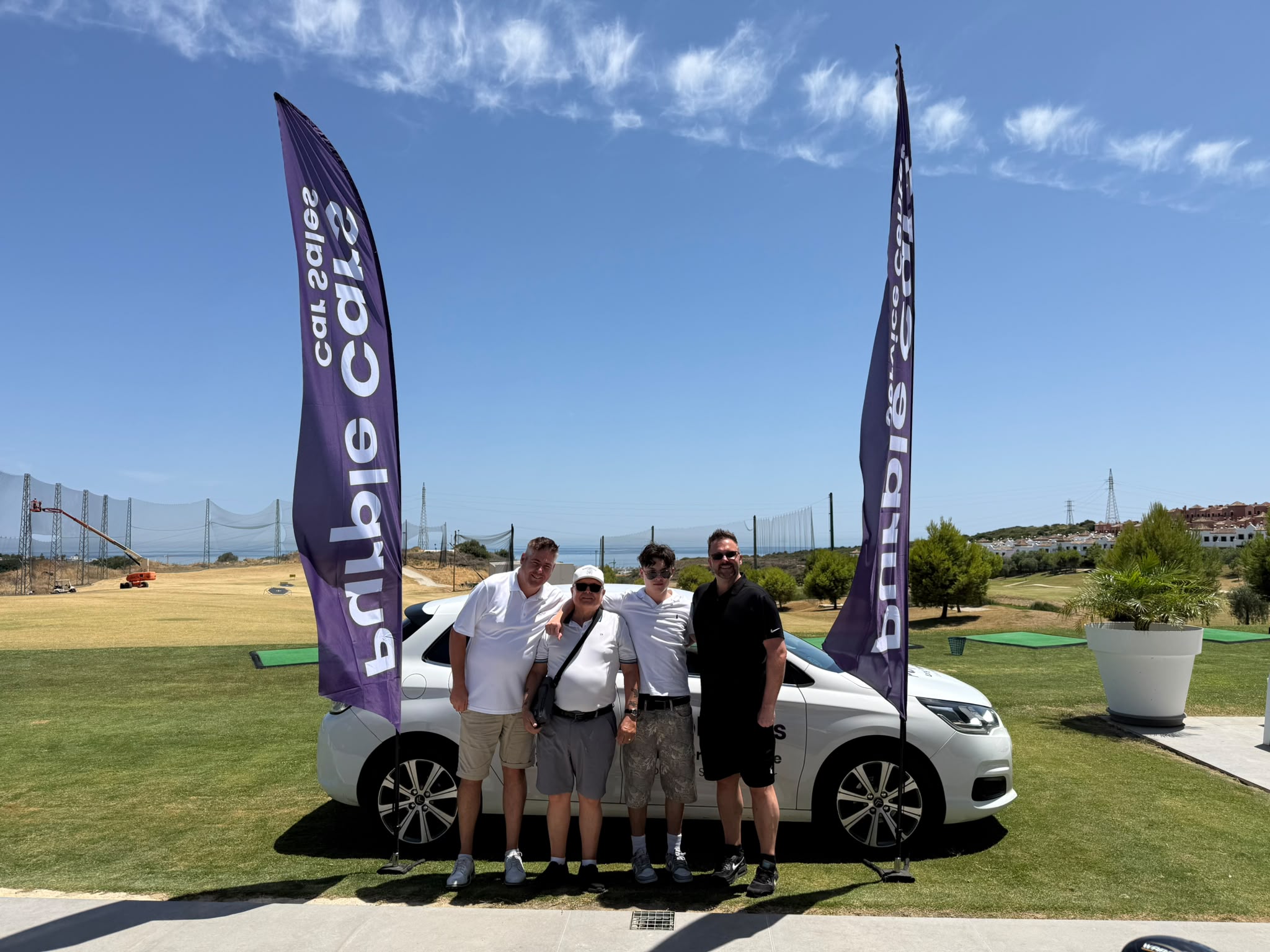 Fourball with the Purple Cars car and banners at Azata Golf