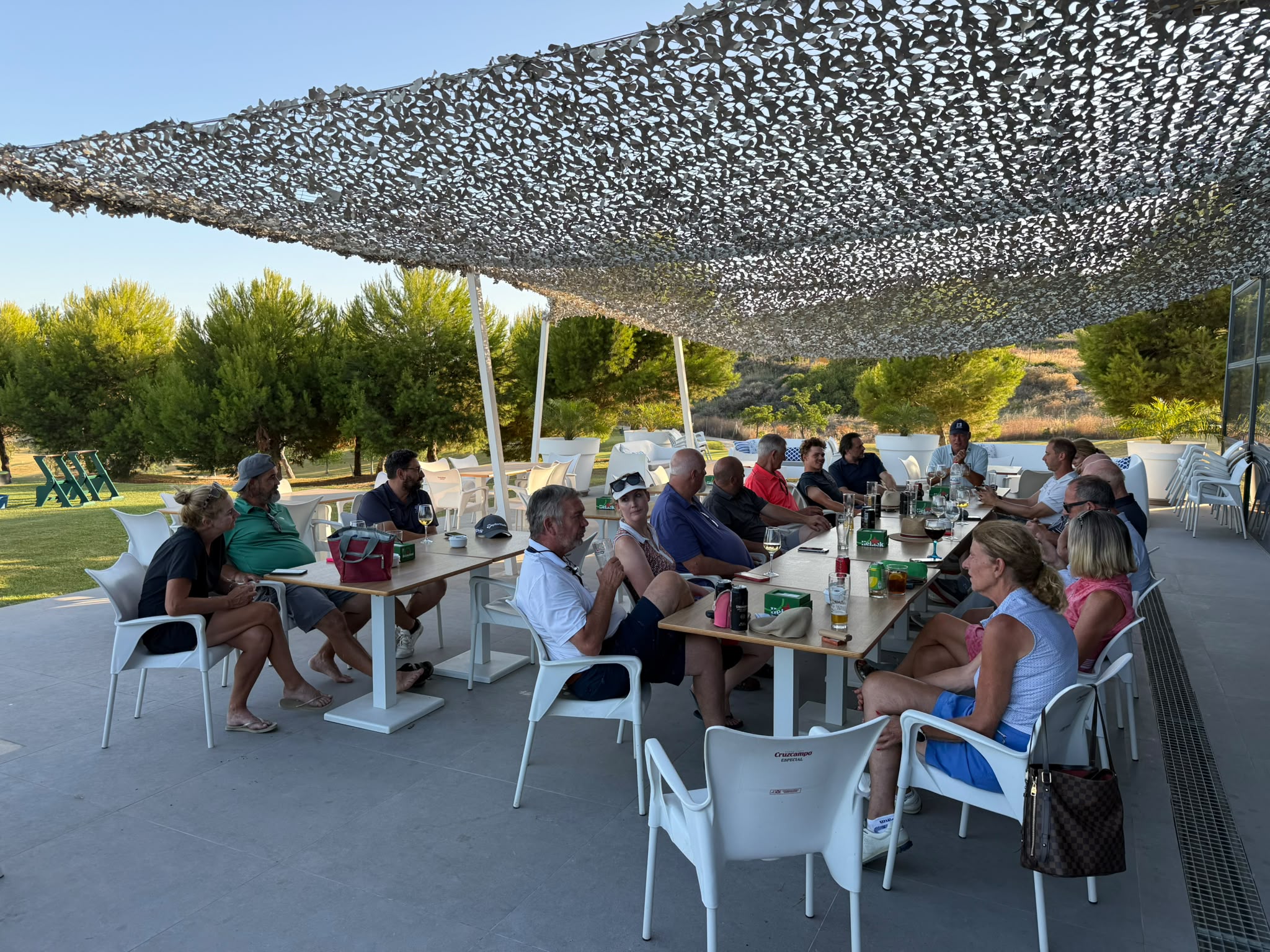 Society members enjoying drinks after the round at Azata Golf