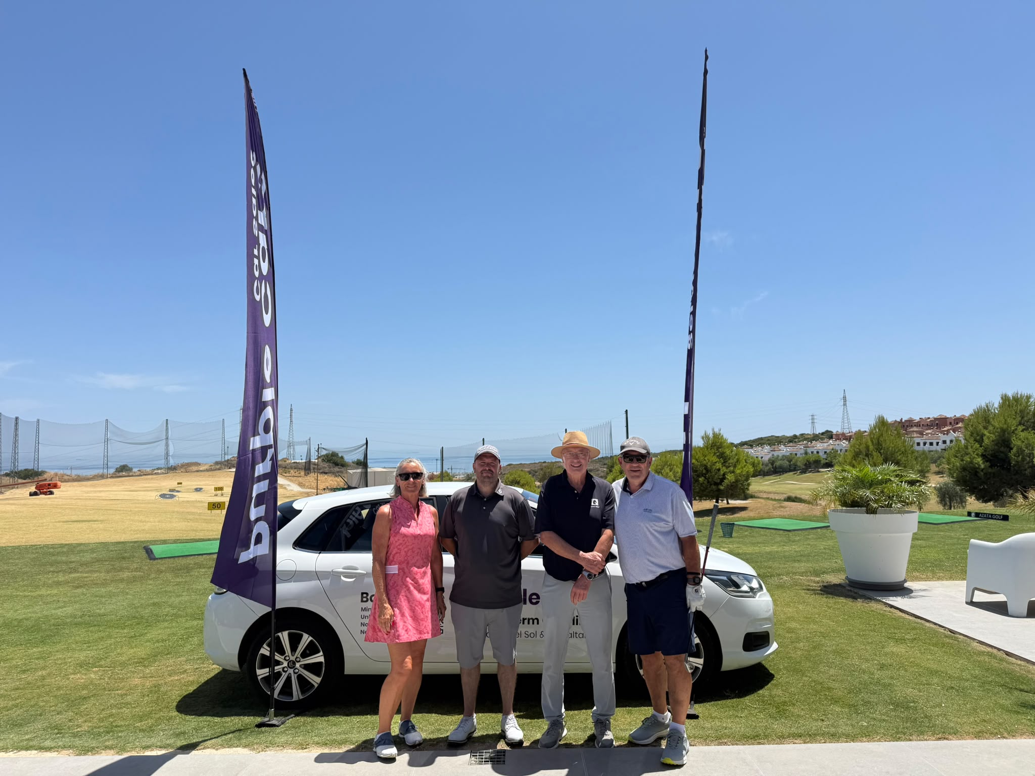 Fourball with the Purple Cars car and banners